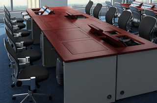 Illustration for article titled Revolution Desk Saves Space With a Fold-Away Workstation